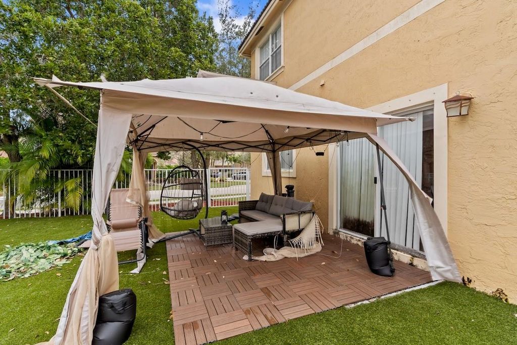 Photo of 904 NW 126th Avenue, Coral Springs, FL 33071 (MLS # F10550722)