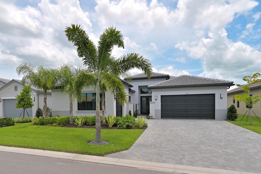 Photo of 11558 SW Surf Springs Road, Port Saint Lucie, FL 34987 (MLS # R11004278)