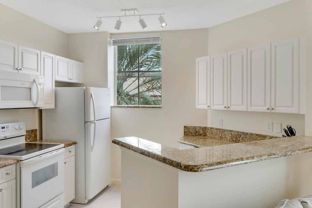 Photo of 630 S Sapodilla Avenue S #411, West Palm Beach, FL 33401 (MLS # B26069786)