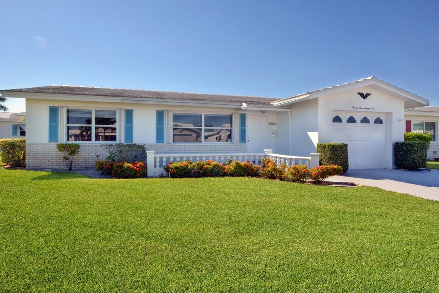 Spacious Back and Front Views from this nicely updated Edgewood 2Br/2Ba with Full Fla. room.  Double concrete drive plus oversized front porch and back patio.  Roof Replaced 2016.  Windows replaced.  Accordion shutters on front windows and back Fla. room Door. Electrical panel replaced. A/C and Hot water replaced. Both baths replaced vanities, electrical fixtures, commodes and have A/C in both. Crown molding thru out home. Extra closet and cabinetry in Fla. room. Home is in mint condition.  Plank like flooring and neutral carpet in Bedrooms.  PAID UP RECREATION LEASE IN FULL.  VACANT FOR QUICK CLOSE.  PHOTOS ARE VIRTUALLY STAGED TO GIVE IDEAS FOR DECOR. Free Par 3 Golf plus 3 active clubhouses and 3 heated community pools.  Minutes to shopping, ocean beaches and I95.  A  GEM.