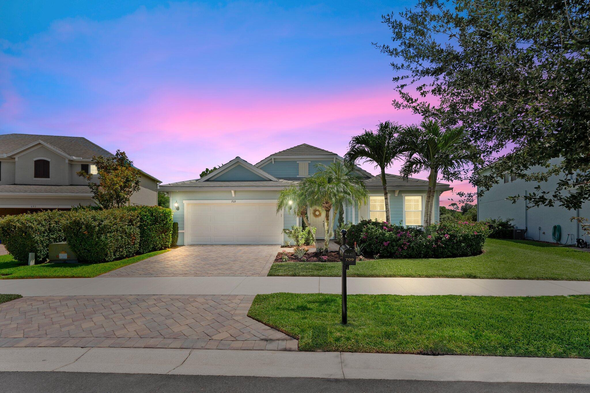 Here Comes the SUN! Welcome to paradise in the exclusive, gated Copperleaf community! This stunning 4-bedroom, 3-bath Key West-style home offers 2,469 square feet of beautifully designed living space on a private lakefront lot. With classic plantation shutters, a bright and airy split floor plan, and a screened-in patio, this home was made for relaxed Florida living. The well-appointed kitchen features 42'' cabinets, granite countertops, and stainless steel appliances--perfect for both everyday meals and entertaining.Retreat to the spacious main suite with dual walk-in closets, dual vanities, and private patio access. The backyard is a blank canvas with plenty of room to design your dream pool oasis.Enjoy Copperleaf's unmatched resort-style amenities including a clubhouse, tennis
