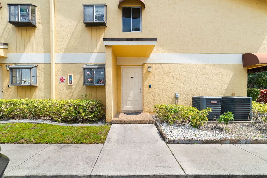 Photo of 3095 N Oakland Forest Drive #101, Oakland Park, FL 33309 (MLS # B26024365)
