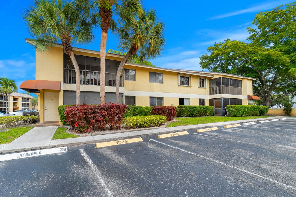 Photo of 3095 N Oakland Forest Drive #101, Oakland Park, FL 33309 (MLS # B26024365)