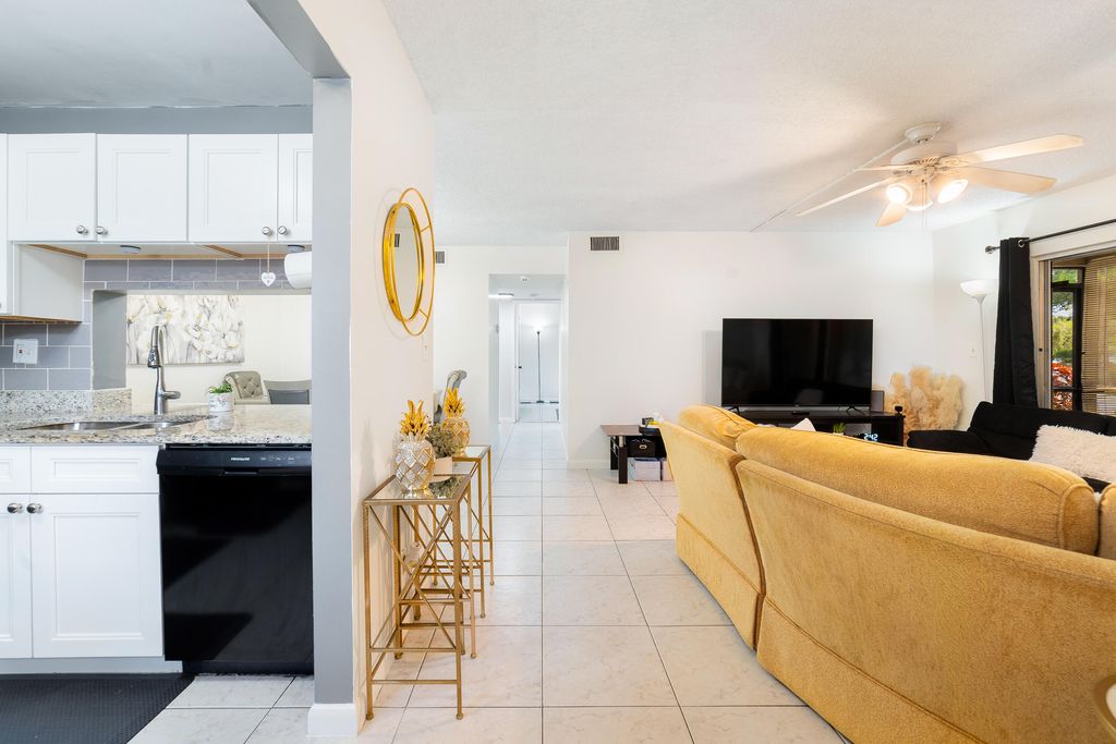 Photo of 3095 N Oakland Forest Drive #101, Oakland Park, FL 33309 (MLS # B26024365)