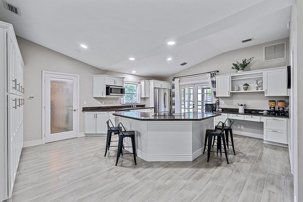 Photo of 12147 68th Street N, West Palm Beach, FL 33412 (MLS # R10933342)