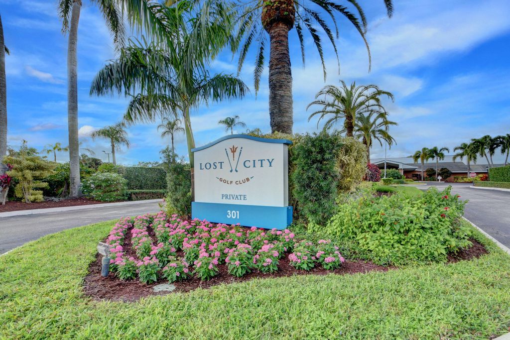 Photo of 377 S Country Club Drive, Atlantis, FL 33462 (MLS # R10981972)