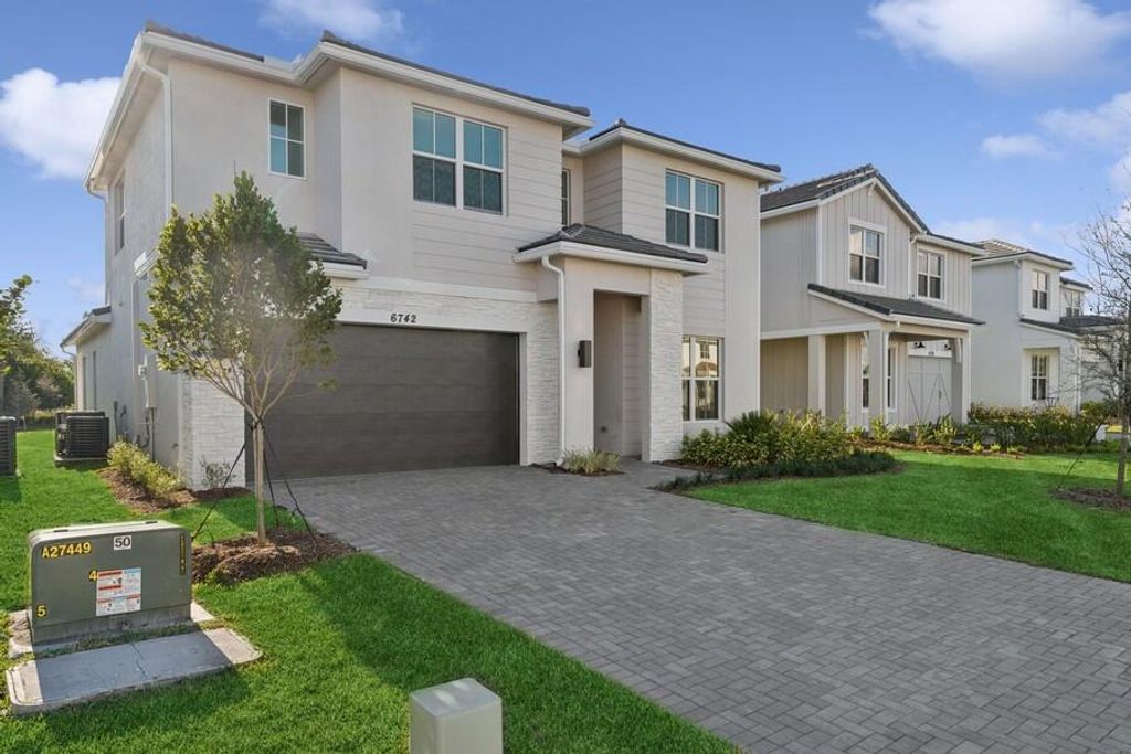 Photo of 6742 SE Lost Pne Drive #17, Stuart, FL 34997 (MLS # R11031413)