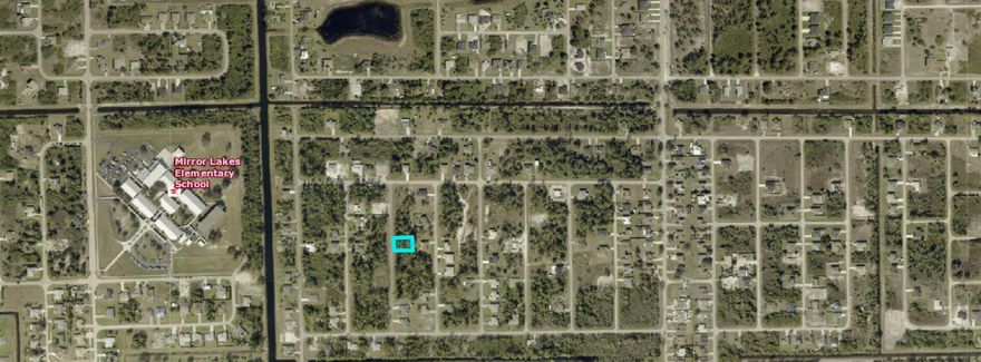 Discover an excellent opportunity to build your dream home or invest in growing Lehigh Acres. This vacant residential lot is approximately 0.24 acres with surrounding undeveloped land, offering privacy and development flexibility. Situated on a quiet street yet conveniently located near major roads, shopping, dining, and schools, the property offers substantial upside in an active Florida market. Buyer to verify lot size, building requirements, utilities, zoning, and tax status.