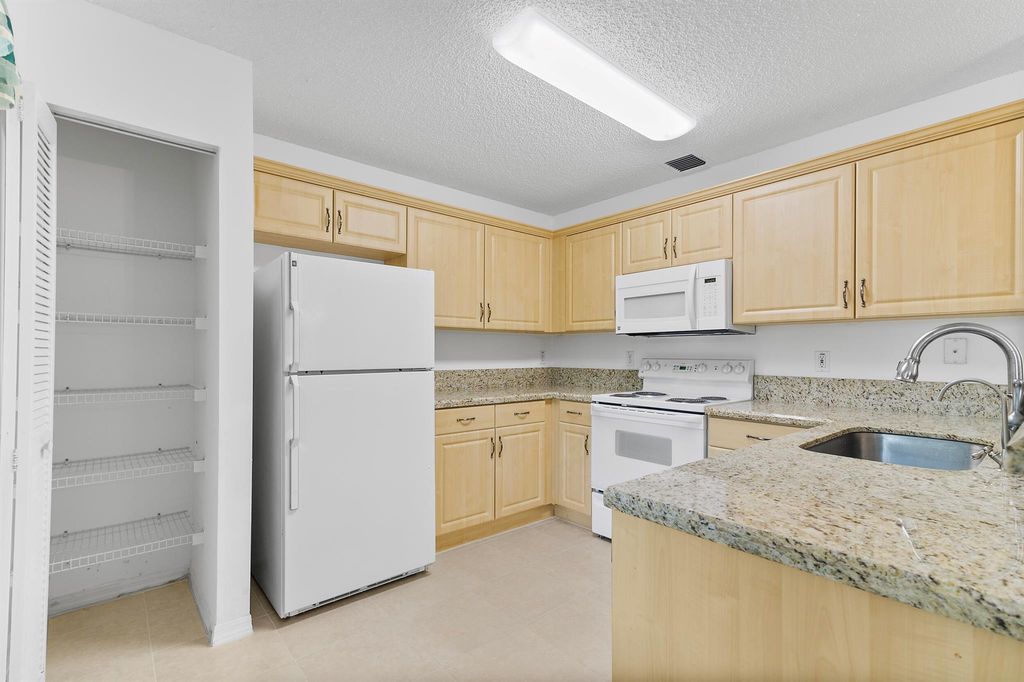 Photo of 4413 SW 11 Place, Deerfield Beach, FL 33442 (MLS # R11015863)