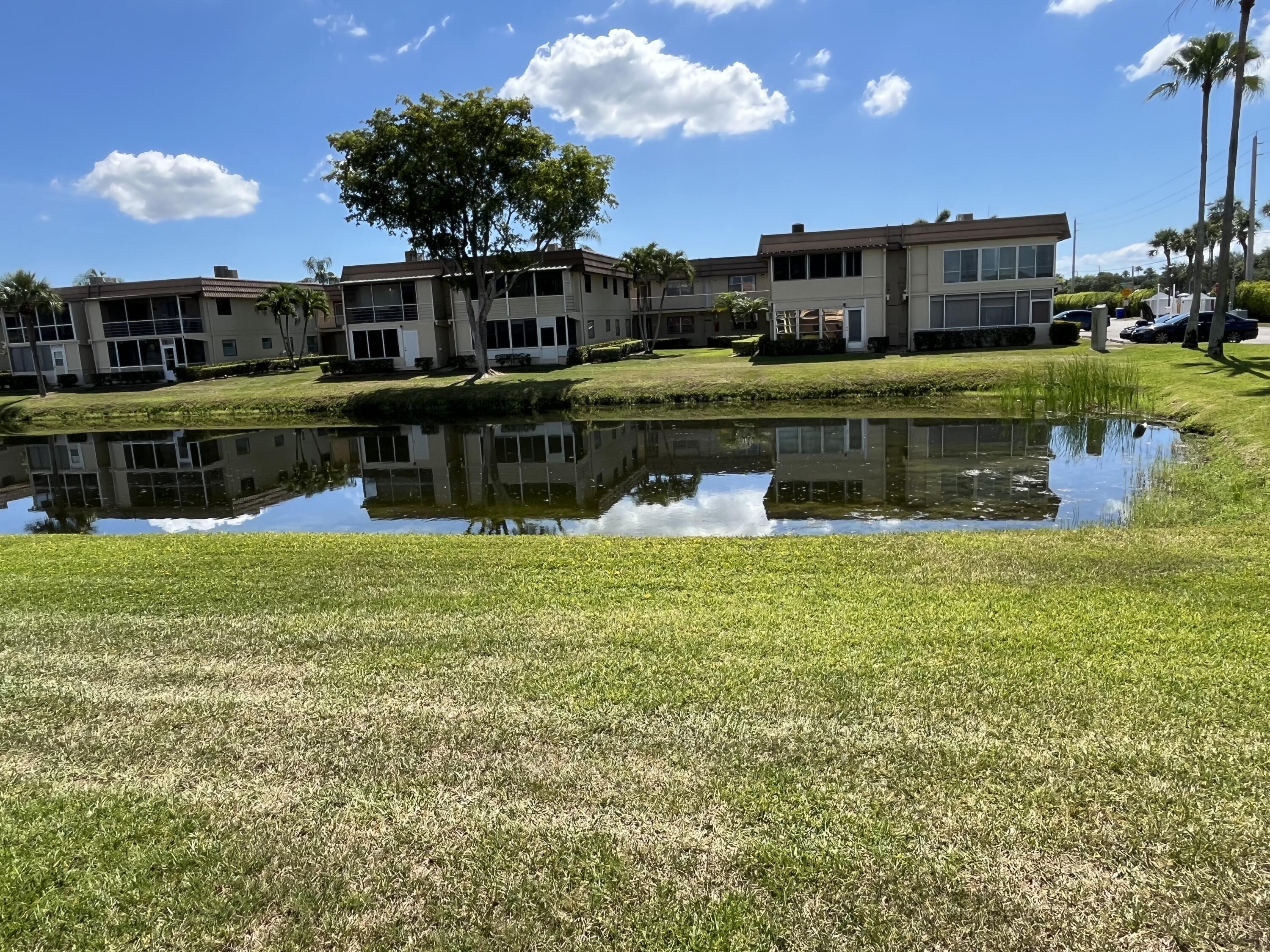 really spectacular and so, so clean ground floor 1/1.5 unit in the Saxony section of Kings Point. The patio faces morning sun (east exposure) overlooking a very peaceful/serene water view. That patio is enclosed with window a/c as well. Tile neutral colored flooring throughout. Washer/dryer in patio utility closet. Updated kitchen and bathrooms. Unit comes fully furnished, so move right in! Parking very close to walkway by the entrance as well. Great unit on the ground floor.