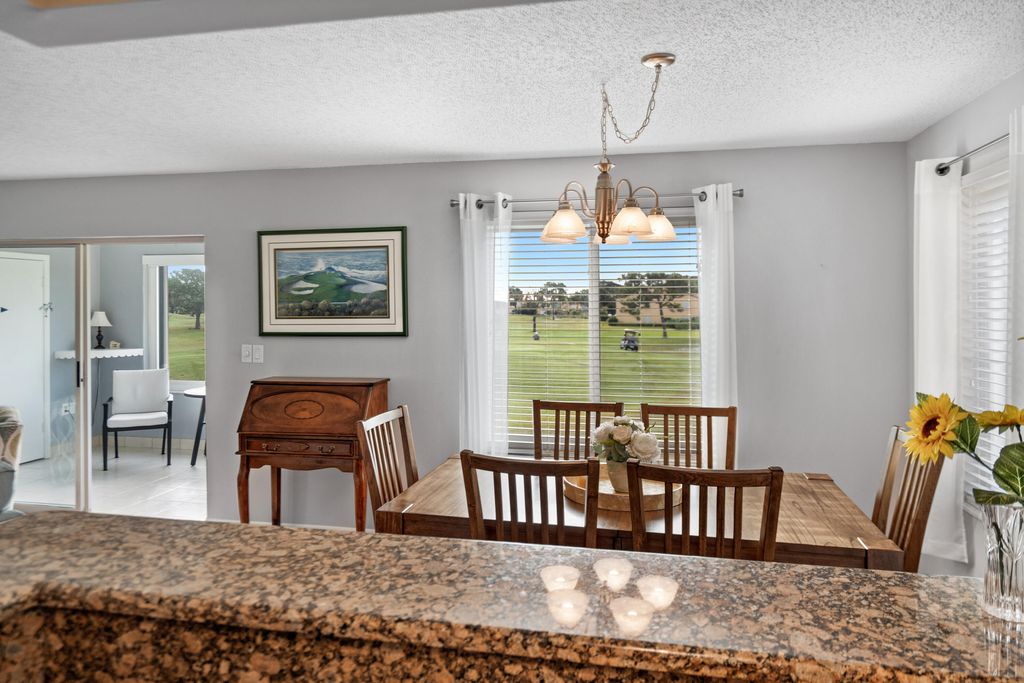 Photo of 5393 SE Miles Grant Road SE #202, Stuart, FL 34997 (MLS # B26028778)