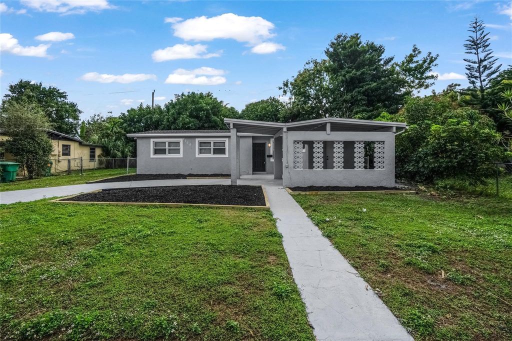 Photo of 4730 NW 11th Place, Lauderhill, FL 33313 (MLS # F10548054)