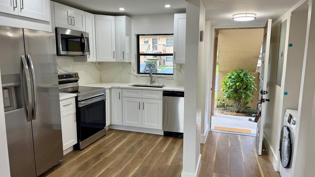 Photo of 21905 Lake Forest Circle #101, Boca Raton, FL 33433 (MLS # R11130835)