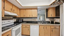 VILLAGES OF ORIOLE DEAUVILLE CONDO - Residential