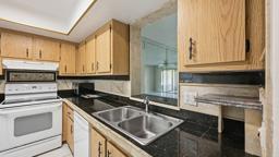 VILLAGES OF ORIOLE DEAUVILLE CONDO - Residential