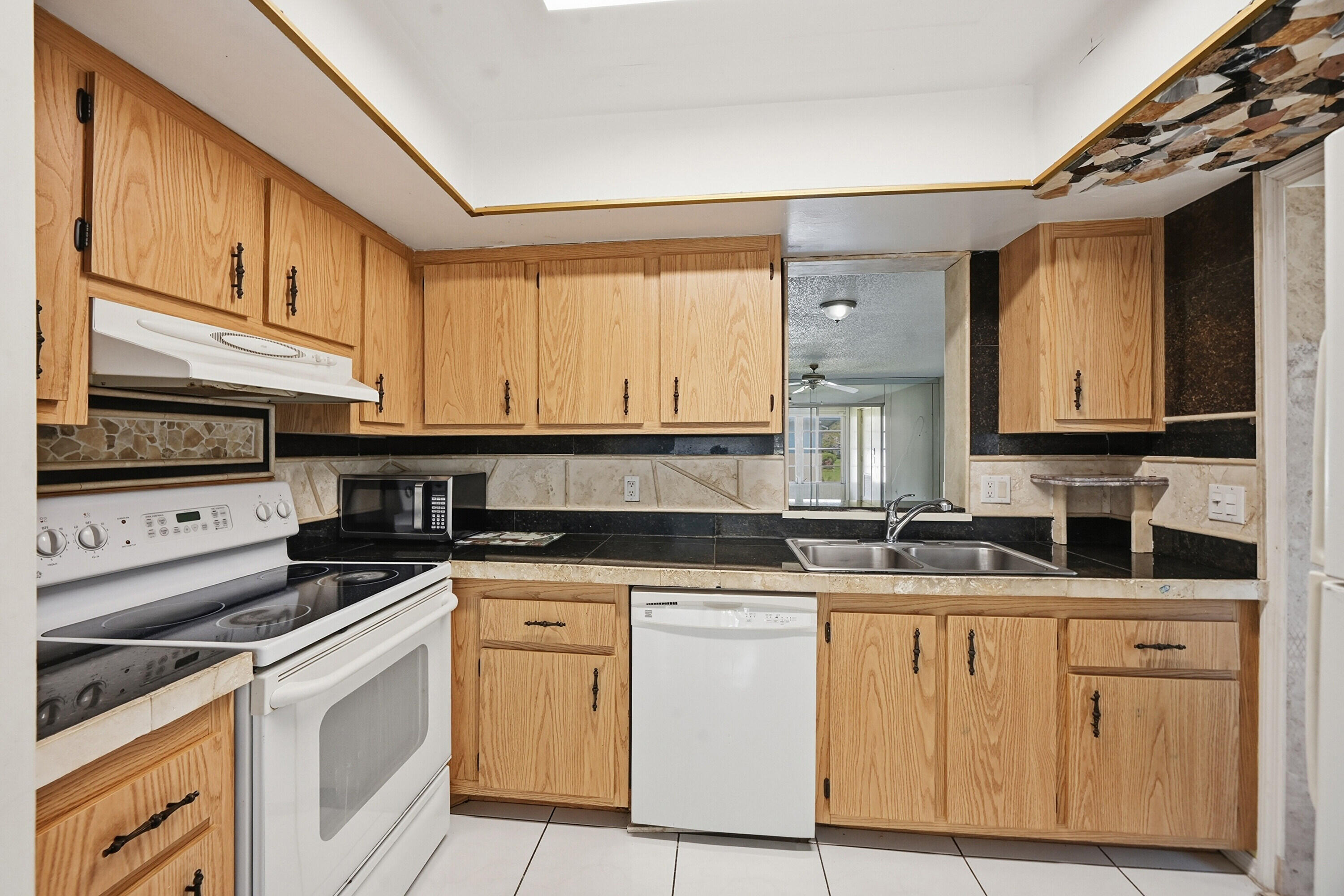 VILLAGES OF ORIOLE DEAUVILLE CONDO - Residential