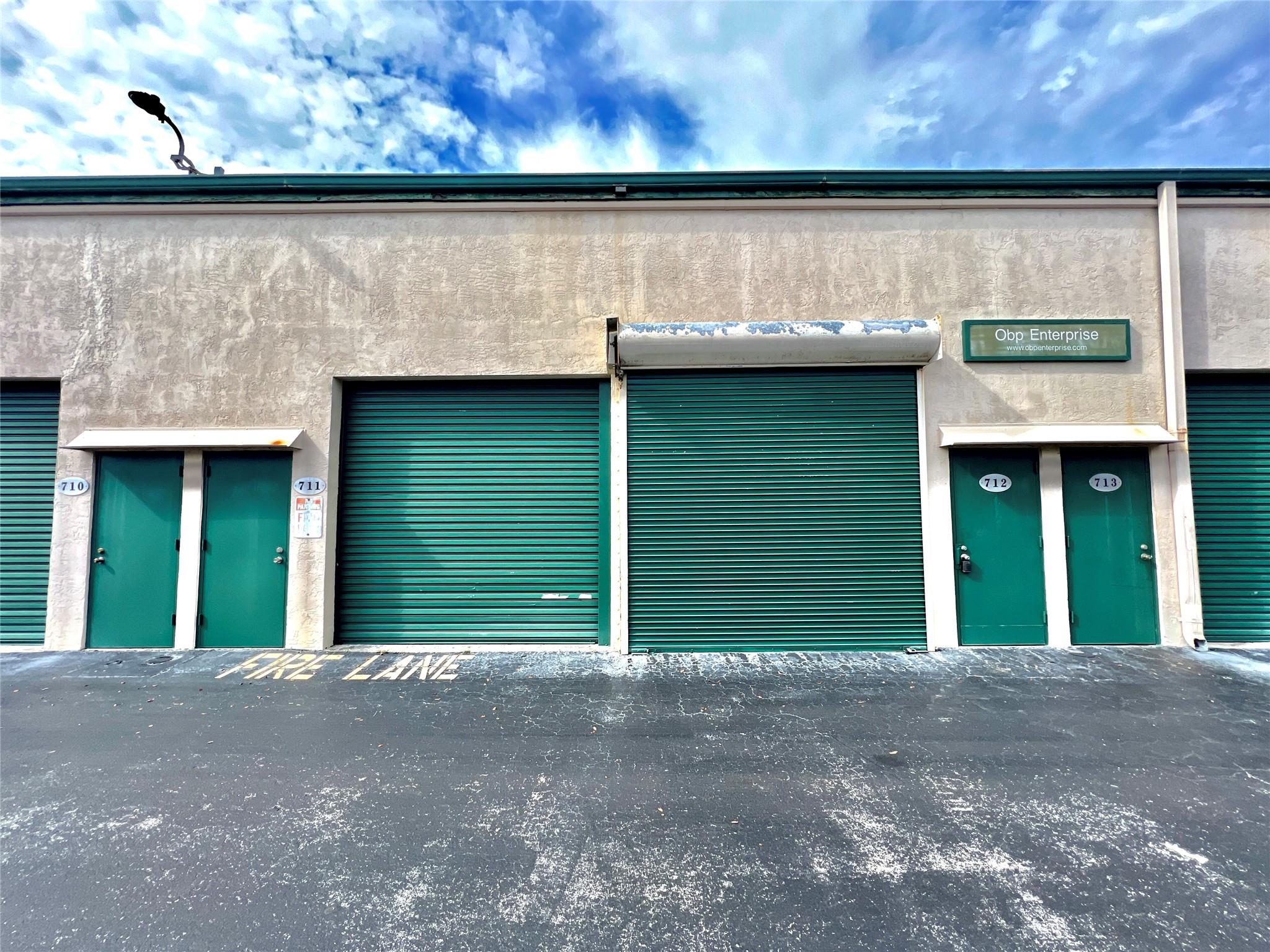 Great opportunity to own this spacious warehouse that is approximately 435 times two as there are two combined. The ground floor per the tax record shows 435 sf for each unit. The upstairs has a fully built-out mezzanine. The owner is relocating and will not need the space. The roll-up doors are 10ft. The warehouse is zoned I-1. Located in an opportunity zone with easy access to all major thoroughfares: The Florida Turnpike and I-95. You can google Blount Rd Adam Docktor and the video is on youtube. HOA is $164 for both