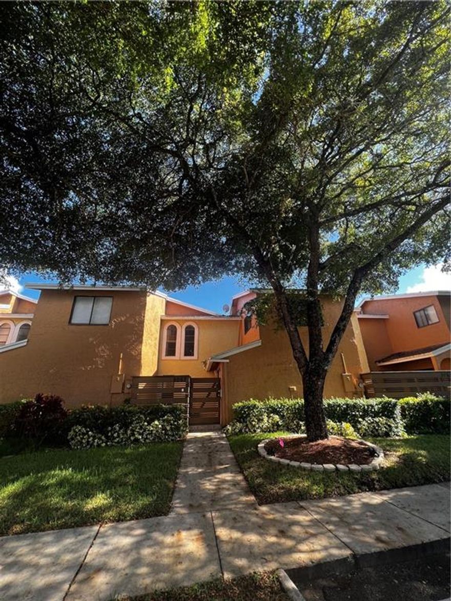 Beautiful 3 bedroom 3 full bath townhome with two private court yards. Tile on the first floor and laminate on the second. Newly remodeled bathrooms and laminate flooring. Upgraded kitchen with passthrough windows. Master bedroom on the second floor. Full size washer and dryer with extra storage underneath the stairs. One bedroom conveniently located on the first floor with a full bathroom.  Two assigned parking spaces and guest parking available. No rental restrictions. Okay to rent right away! Great investor opportunity! This is a must show!