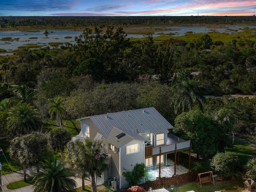 Photo of 112 Riverview Drive, Jensen Beach, FL 34957 (MLS # R10859086)