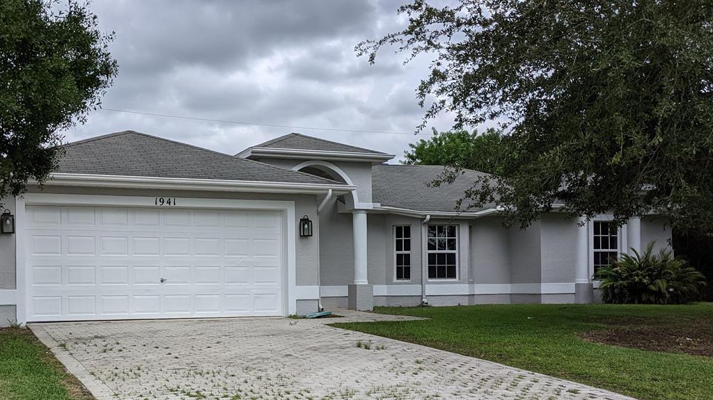 Photo of 1941 SW Fanfare Street, Port Saint Lucie, FL 34987 (MLS # R10762219)
