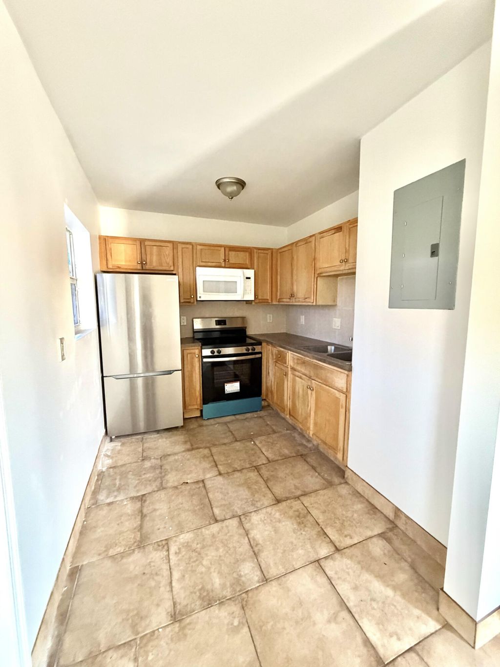 Photo of 701 NW 21st Terrace, Fort Lauderdale, FL 33311 (MLS # B26001636)