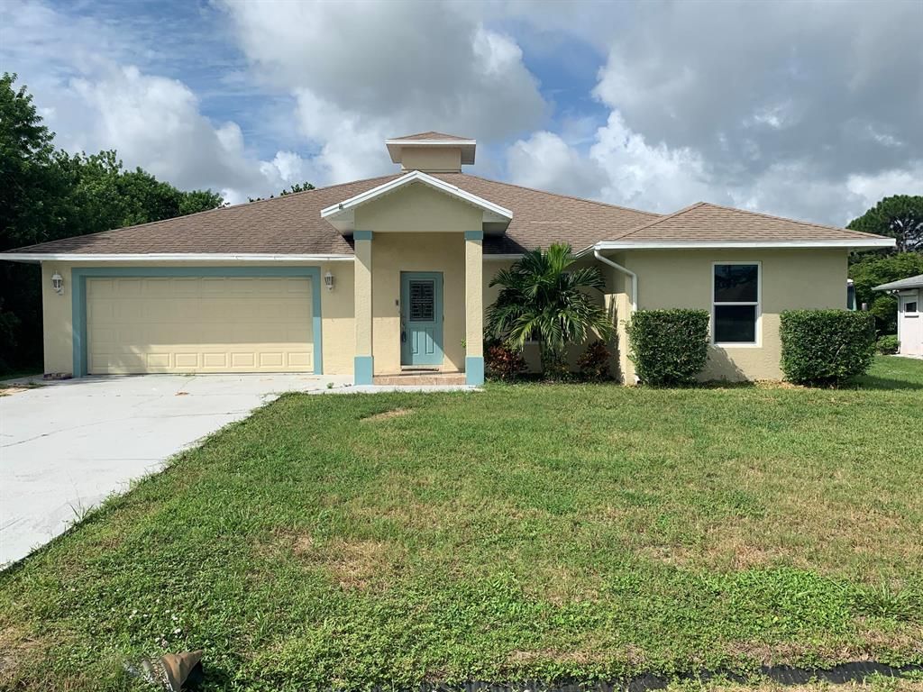 Photo of 2238 SE Carnation Road, Port Saint Lucie, FL 34952 (MLS # R10736419)