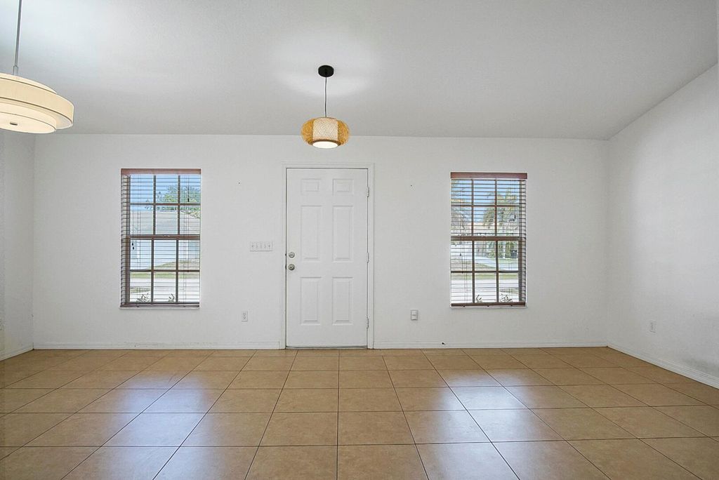 Photo of 842 SW Haas Avenue, Port Saint Lucie, FL 34953 (MLS # R10977463)