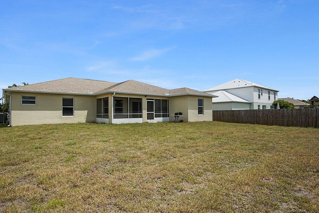 Photo of 842 SW Haas Avenue, Port Saint Lucie, FL 34953 (MLS # R10977463)