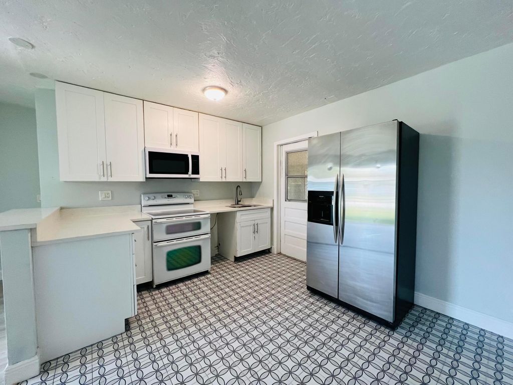 Photo of 1348 9th Street, West Palm Beach, FL 33401 (MLS # R11156833)