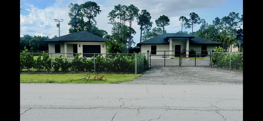 Photo of 18477 Sycamore Drive W, The Acreage, FL 33470 (MLS # B26075535)