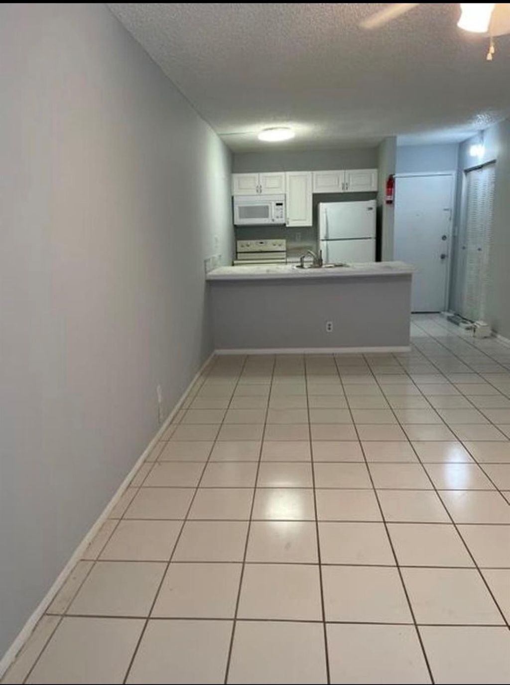 Photo of 2701 Riverside Drive #107b, Coral Springs, FL 33065 (MLS # F10555413)