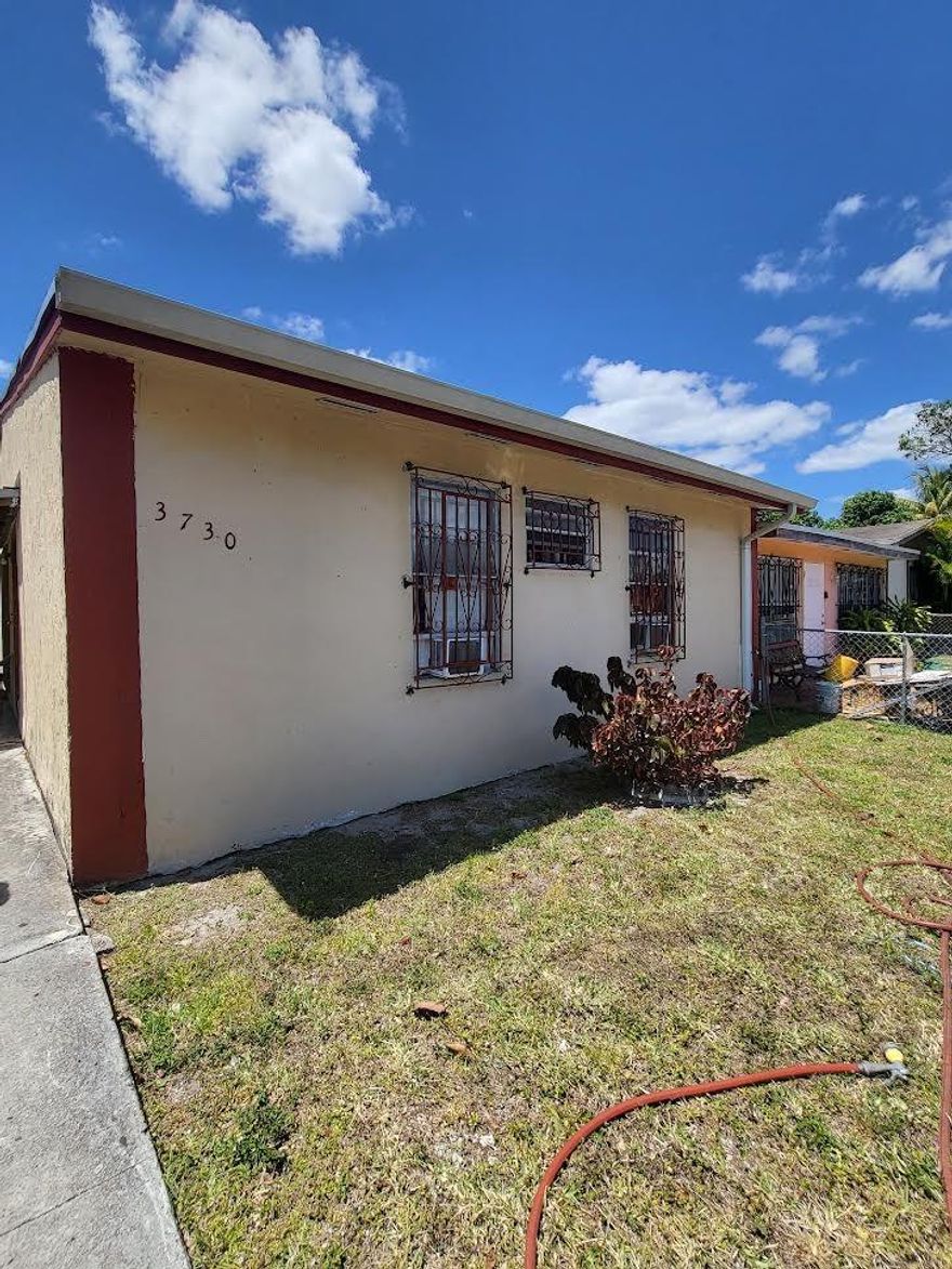 Centrally located Vista Verde townhouse/villa - large corner unit with a full 4 bedroom, 2 bathroom and a large wraparound yard. Needs some cosmetic work, but is ideal for a first time homebuyer, investor (for rental or AirBnB rental), in up and coming Miami Gardens. Take advantage of an increasing market and get a large, corner home immediately. Property is tenant occupied and showings by appointment only!