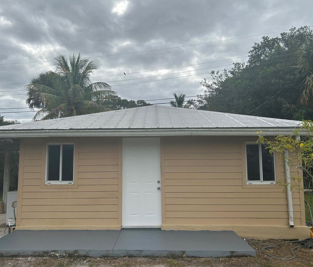 Photo of 337 E Midway Road #(Cottage), Fort Pierce, FL 34982 (MLS # R11038477)