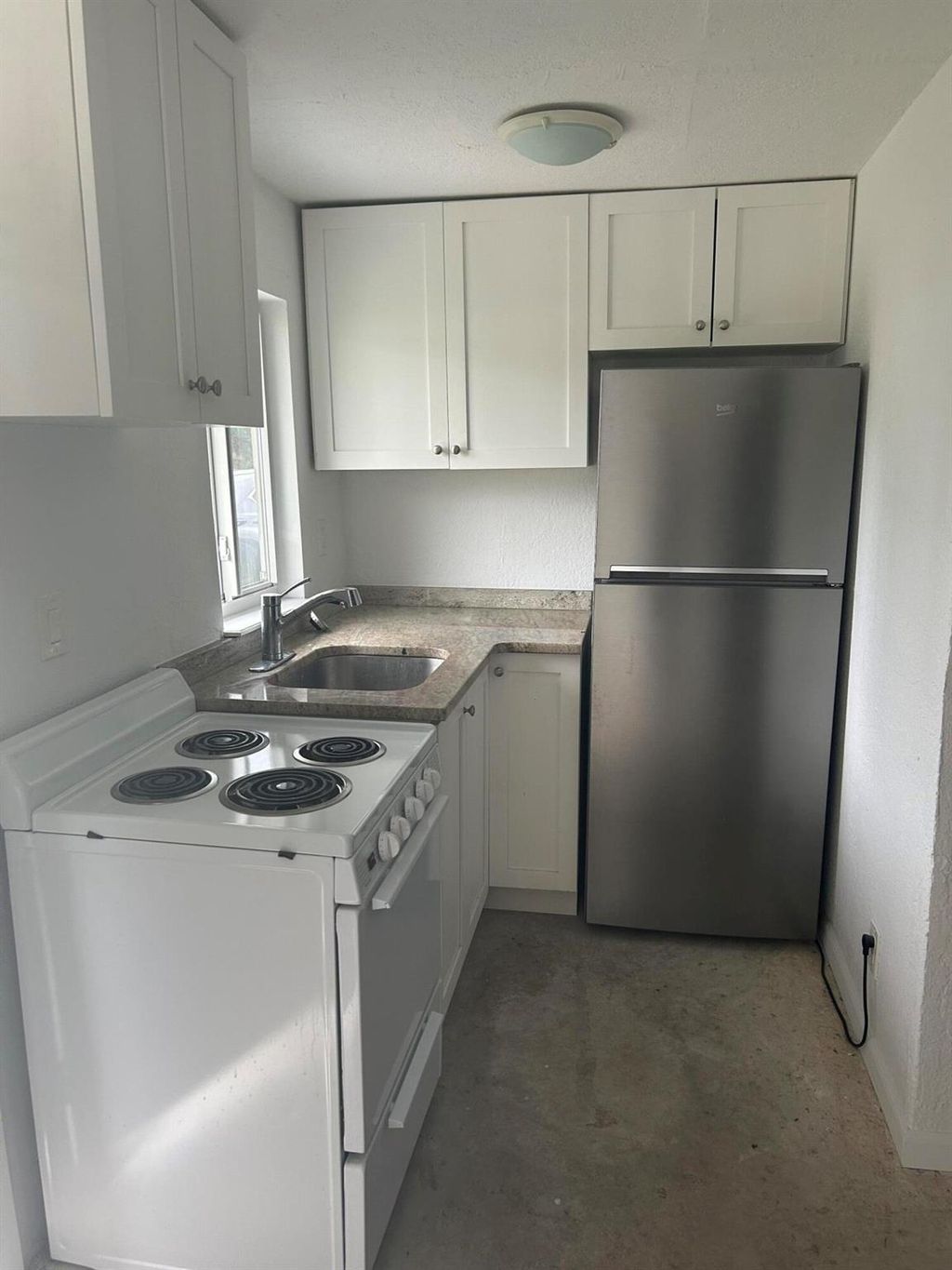 Photo of 337 E Midway Road #(Cottage), Fort Pierce, FL 34982 (MLS # R11038477)