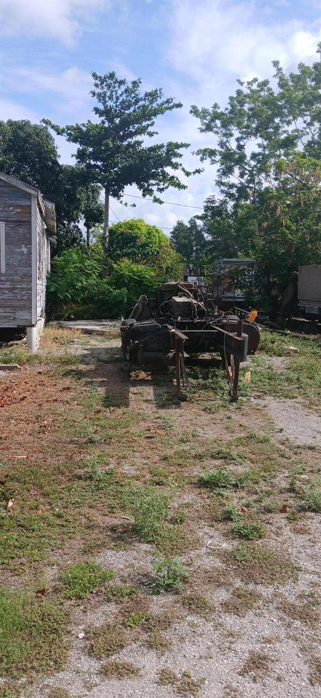 Photo of 1709 NW Avenue G Avenue, Belle Glade, FL 33430 (MLS # R11092259)