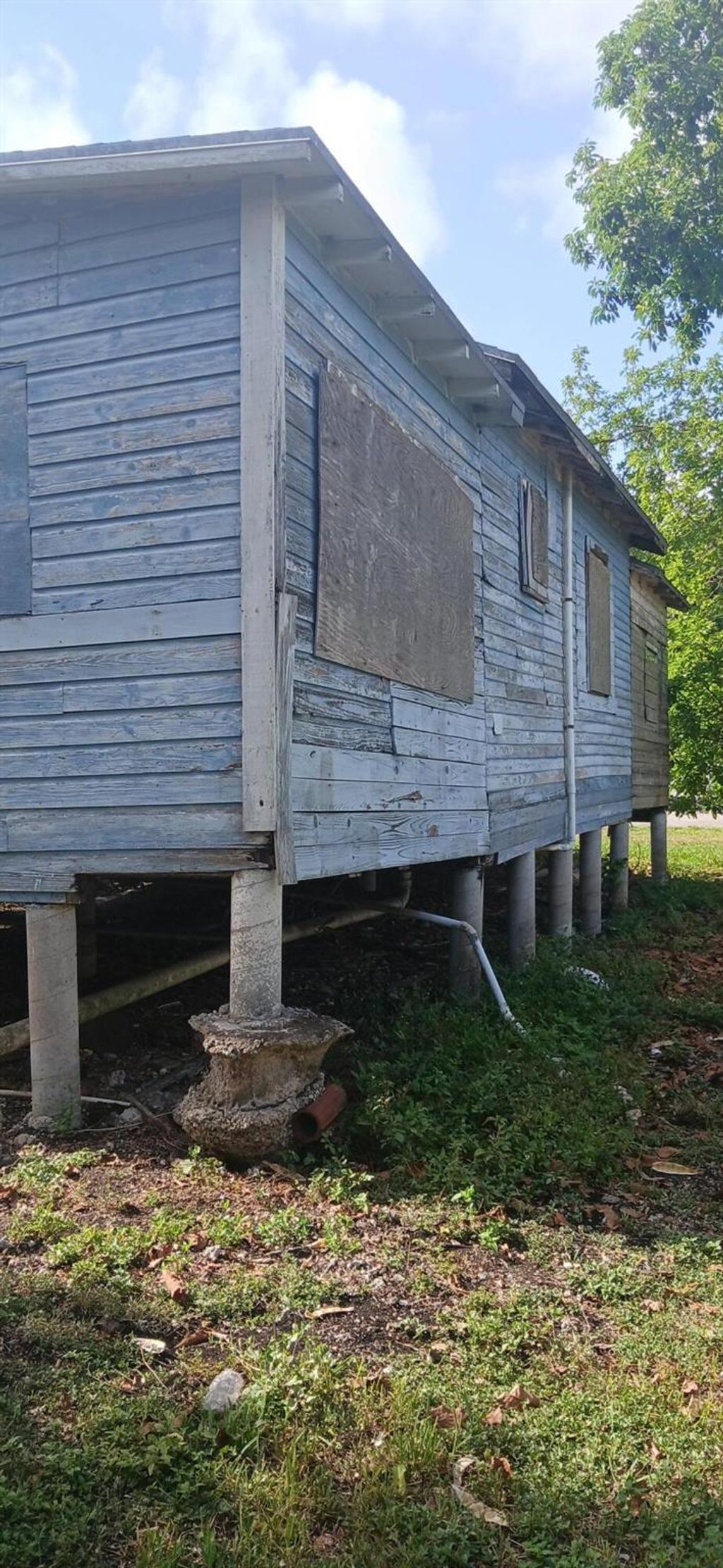 Photo of 1709 NW Avenue G Avenue, Belle Glade, FL 33430 (MLS # R11092259)