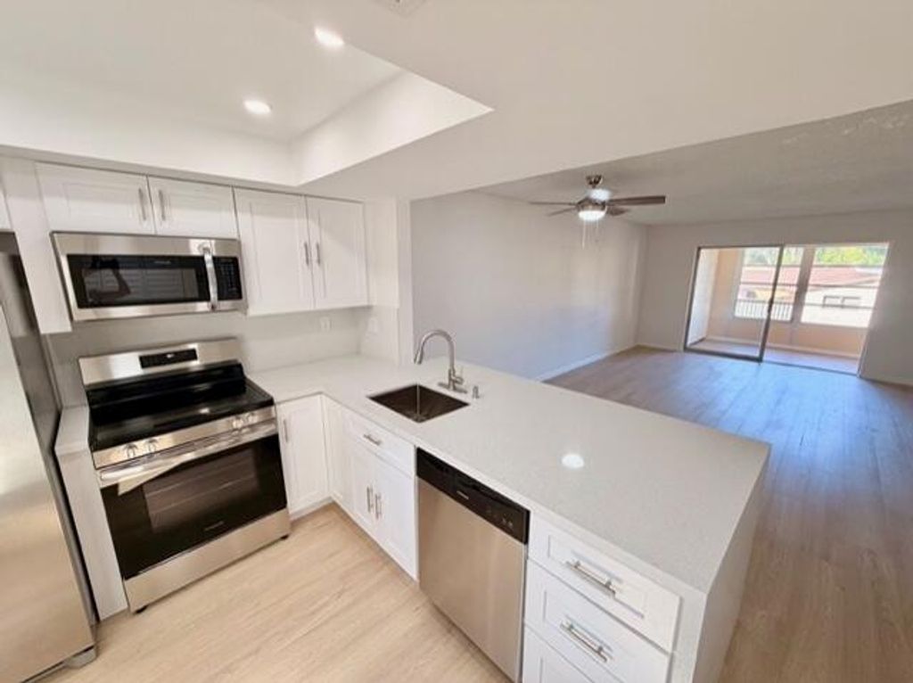 Photo of 9374 SW 3rd Street #714, Boca Raton, FL 33428 (MLS # B26030440)