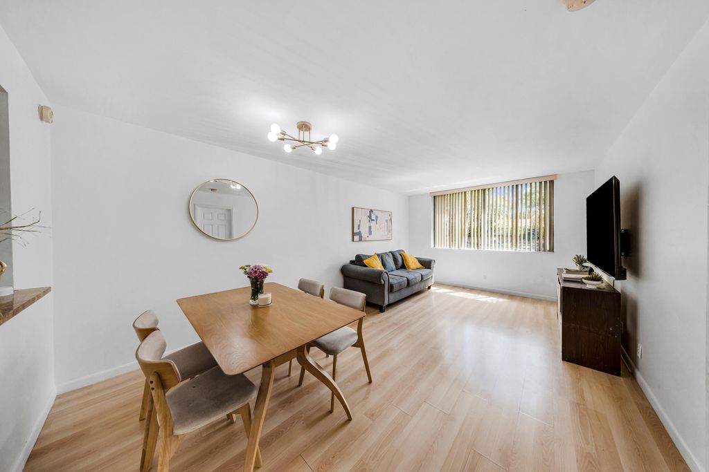 Photo of 3249 Riverside Dr #D-202, Coral Springs, FL 33065 (MLS # B26006902)