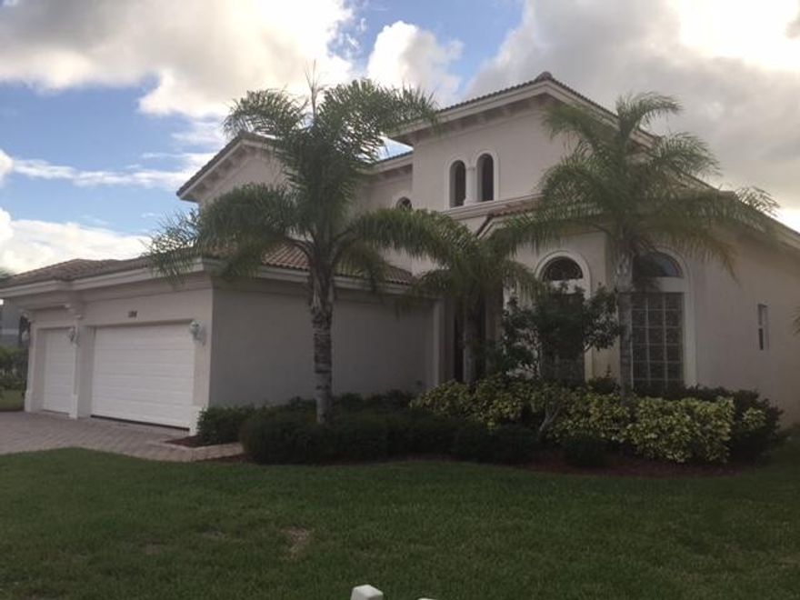 Spacious 4/3 home in upscale gated neighborhood, Nice view of lake right outside your sider doors. Fenced yard with attractive aluminum fence. High quality kitchen cabinets. Master bedroom with 2 walk-in closets and large master bath, 2 sinks and separate shower. Large paver lanai. Three car garage. House has alarm system installed. Club house with large pool, tennis courts, basketball court, exercise, and meeting rooms. HOA includes all lawn and landscaping care.