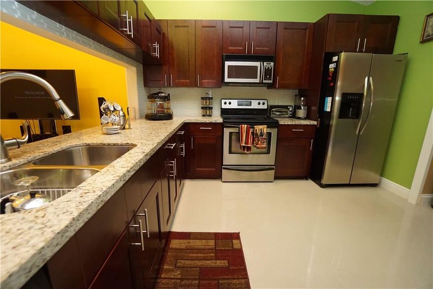 ABSOLUTELY STUNNING! WATERFRONT 4/2 CORNER UNIT VILLA. AC INSTALLED YEAR 2018.TOTALLY UPDATED WITH GORGEOUS GRANITE COUNTERTOPS, STAINLESS STEEL APPLIANCES, UPDATEDCABINETS, STUNNING VAULTED CEILINGS, LARGE ROOMS WITH PLENTY OF EXTRA STORAGE SPACE. HUGEMASTER BEDROOM WITH EXTRA LARGE WALK IN CLOSETS. ENJOY RELAXING DAYS ON YOUR PATIO ON THISBEAUTIFUL LAKEVIEW. THIS QUIET COMMUNITY IS TUCKED AWAY YET SO CLOSE TO EVERYTHING. 4THBEDROOM WALL WAS TAKEN DOWN AND CAN BE USED AS A SLEEPING AREA OR BONUS ROOM.