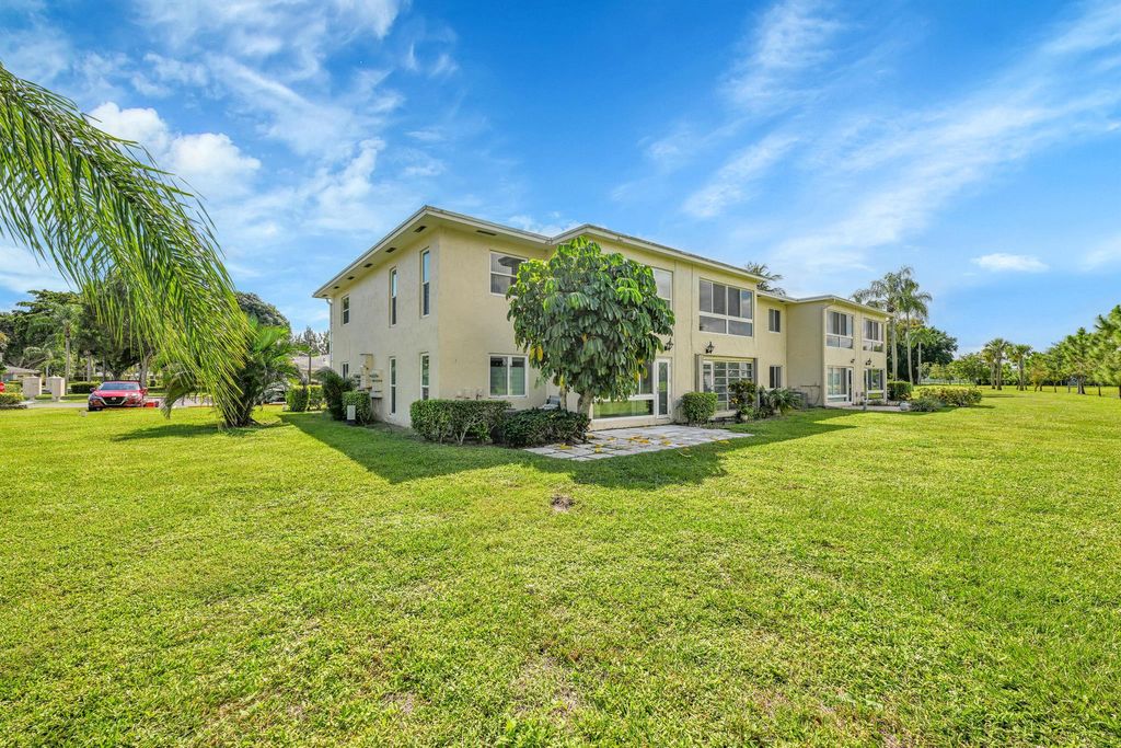 Photo of 13791 Flora Place #D, Delray Beach, FL 33484 (MLS # R11134926)