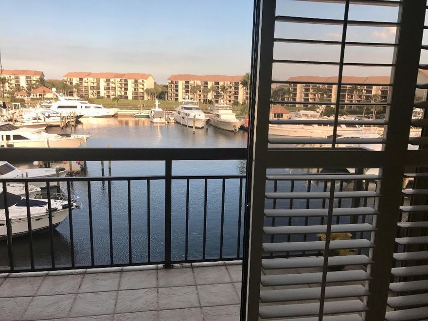 Spectacular Boat Marina Views from your Balcony! 2/2 Waterfront Condo. 
MOTIVATED SELLER; Bring an Offer!
10 Min Walk to the Beach! Recently Upgraded Kitchen w/ Newer Appliances, Cabinets & Tiles. Granite + Corian Countertops. Bonus Room + Laundry Rm. Master Bedroom has laminate floors. Crown Molding in living room, dining area & doors. Plantation Shutters. Master BA has beautiful Vanity w/ Brass Sink & matching mirror. Hurricane Shutters installed on each Window! Newer A/C replaced in 2015. All other Appliances are a few years old. Community offers 4 Swimming Pools, Tennis Court, Bocce Court. Marina offers 100 deep water Boat Slips, Intracoastal access w/ No fixed bridges. Walking distance to Ocean, shopping, restaurants. 20 Min Drive to Kravis Ctr, Cityplace, Convention Ctr + WPB Airpo