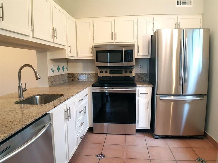 Updated condo nestled in beautiful Oakland Forest. Tastefully updated kitchen and baths. Fresh new carpet in the spacious living room and bedrooms. Brand New stainless steal appliances. Washer and Dryer conveniently located inside the condo. Finished walk in closet. Large screened balcony with extra storage. 2nd floor condo offers a nice vaulted ceiling, safety, and no worrying about noisy upstairs neighbors. Well maintained, quiet community with affordable HOA with nice pool area. Pet friendly.