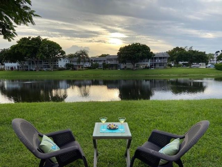 Fabulous condo features new epoxy floors, new open kitchen with quartz countertops, glass mosaic backsplash, stainless steel appliances. New bathrooms with walk in shower. Located close to the beach, great restaurants, shopping plazas and major highways.  Furnished association says 55+ community with resort style amenities.  Enjoy the beautiful lake view from the  patio of this first floor unit while having morning coffee or your favorite cocktail in the evening.  Hurry this one won't last long.