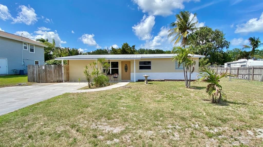 Photo of 8913 SE Colony Street, Hobe Sound, FL 33455 (MLS # R10711411)