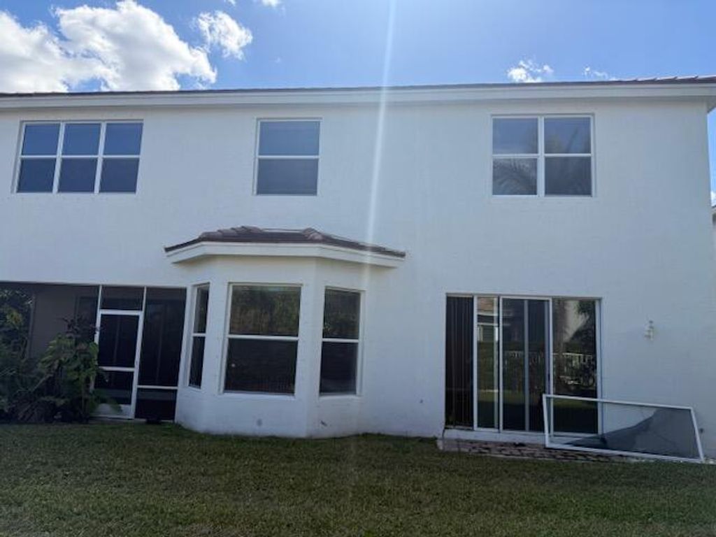 Photo of 9345 Madewood Ct, Royal Palm Beach, FL 33411 (MLS # R11162267)