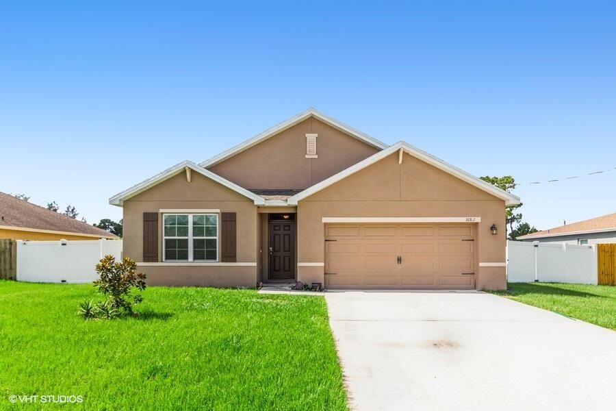 Photo of 1682 SW Boykin Avenue, Port Saint Lucie, FL 34953 (MLS # R10735020)