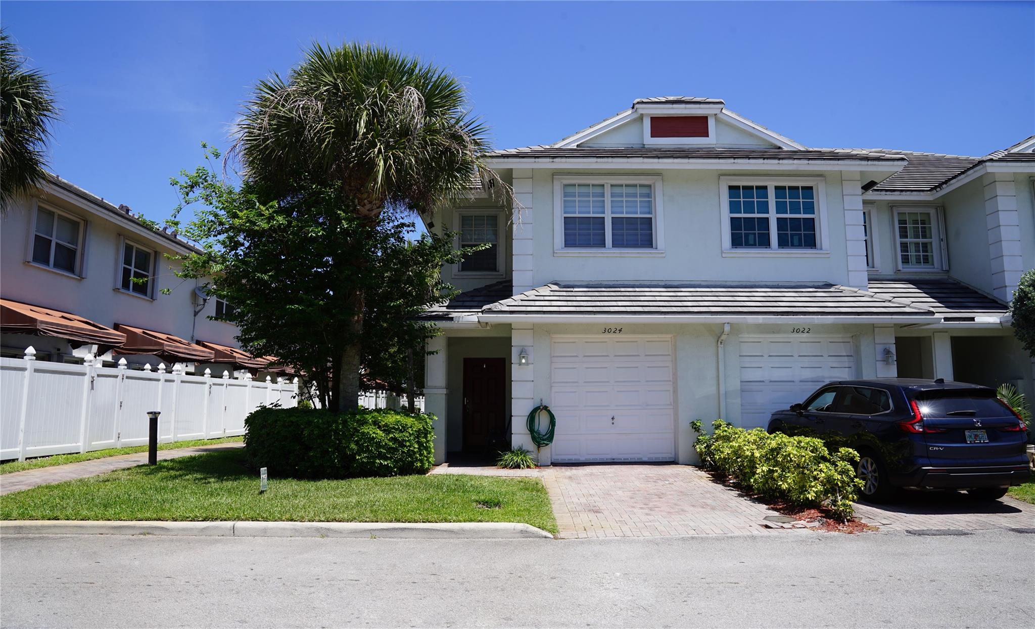 Beautifully maintained 3/2.5 corner townhouse with bonus room and 1-car garage in the desirable Cambridge Park community. Features include a welcoming foyer, spacious living room, open eat-in kitchen with wood cabinets and stainless steel appliances, tile flooring downstairs, and wood flooring upstairs. The large master suite offers a sitting area, walk-in closet, and walk-in shower, while bedrooms 2 & 3 share a Jack & Jill bathroom with double vanity. New A/C installed 06/27/24 new stove, new washer and dryer, and new blinds throughout, and a gated backyard patio perfect for relaxing. Conveniently located just 5–10 minutes from I-95, about 12 mins to Ft. Lauderdale Beach, and close to restaurants, gas stations, and shopping. Community amenities include a pool, playground, and low HOA fees