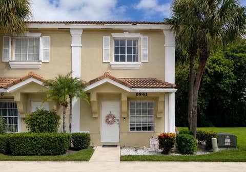 Photo of 6941 Crooked Fence Drive, Lake Worth, FL 33467 (MLS # B26050659)