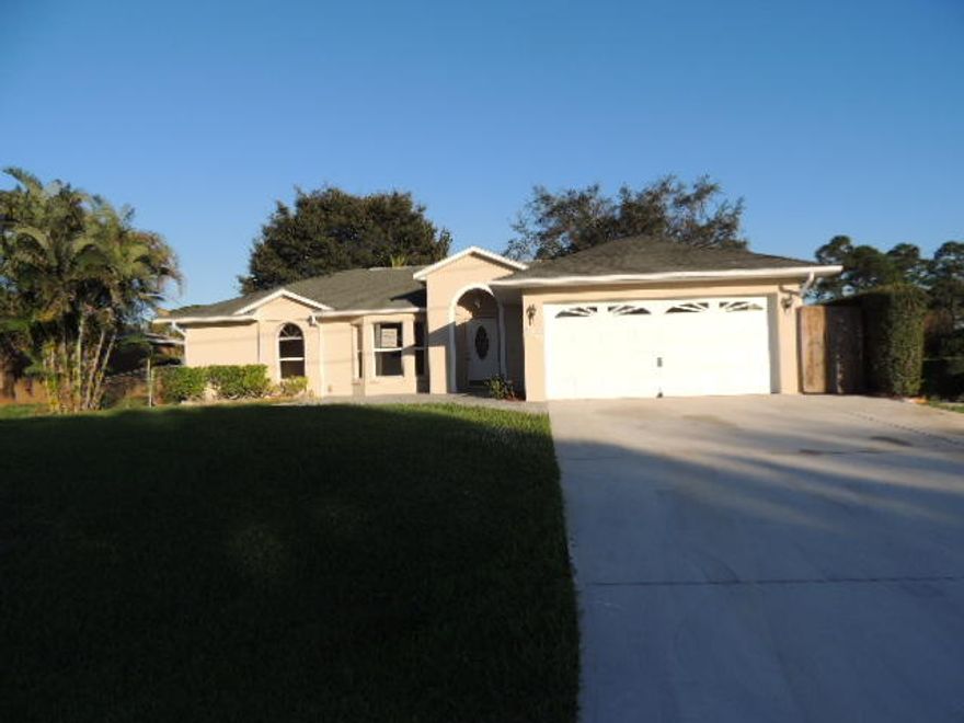 Enjoy the privacy surround of this CBS built home. Home has screened enclose patio and pool with drainage canals to side and rear. Chain link fence line the perimeter of property. Well and septic systems are is functional at property. Floors are tiled in living and wet area with granite countertop in kitchen. Pass through kitchen would make it great for entertaining on pool patio. Interior and exterior has been freshly painted with new carpet and appliances. ***MULTIPLE OFFERS H&B DUE 12/7/15 BY 10:18 AM****